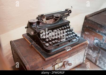 Old Antique Typewriter on a Wood Counter Stock Photo