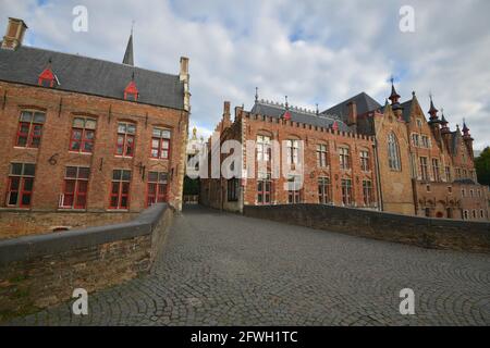 Scenic view of the ancient Blinde Ezelstraat stone bridge and other Gothic style buildings in the historic center of Bruges, West Flanders Belgium. Stock Photo