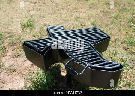 Barbecue grill shaped in the State of Texas in a public park - Texas USA Stock Photo