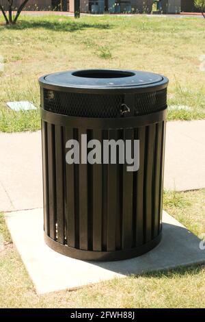 Trash can (rubbish bin) at public park - USA Stock Photo