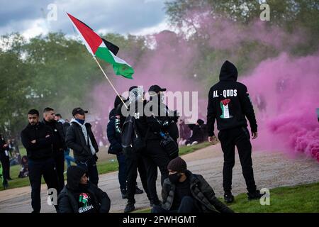 Protesters gather in Hyde Park as they take part during the demonstration.Palestinian Citizens are being subject to violent armed mobs, attempting to drive them from their homes. The violence is part of Israel's regime of institutionalised racist discrimination against the Palestinian people, amounting to the crime of apartheid. The UK Government is expected to take action, which includes implementing sanctions, military embargo to cut the supply of deadly weapons to Israel, and banning the import of goods from Israel's illegal settlements. Stock Photo