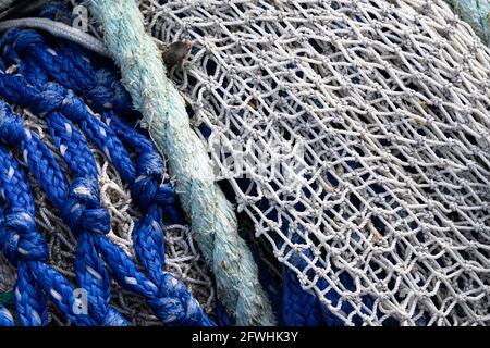 Two fishing nets with green rope Stock Photo