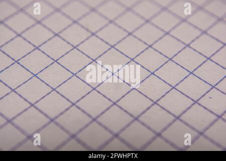 Macro shot with blurred notebook in a cage Stock Photo