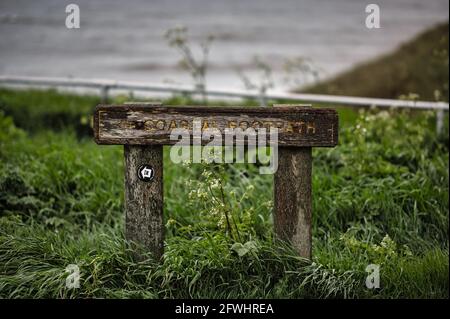 A sign located by the North Sea, England. Stock Photo