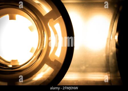 Abstract Sepia Toned Macro Closeup of Cassette Reel Inside of Clear Tape Stock Photo