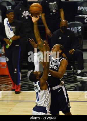 Los Angeles, United States. 22nd May, 2021. Los Angeles Clippers' forward Kawhi Leonard (2) shoots over Dallas Mavericks' forward Tim Hardaway Jr. (11) during the first half of their best-of-seven playoff series opener at Staples Center in Los Angeles on Saturday, May 22, 2021. The Mavericks defeated the Clippers 113-103. Photo by Jim Ruymen/UPI Credit: UPI/Alamy Live News Stock Photo
