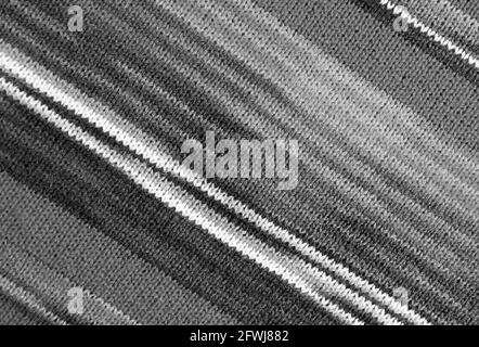 Texture of Monochrome Striped Alpaca Knitted Wool Fabric in Diagonal Patterns for Abstract Background Stock Photo