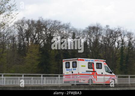 Swiss ambulance car driving to the hospital. Stock Photo