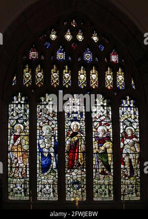 Stained glass window by Percy Bacon depicting Courage, St Ann, Christ in Majesty, St Paul, & Victory, St Mary's Church, Pilsdon, Dorset Stock Photo