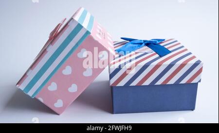 A multi-colored gift box with an open lid. Empty gift boxes on white background with shadow, isolated. Stock Photo