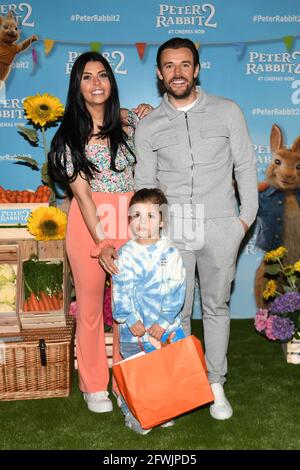 Cara De La Hoyde Massey and husband Nathan Massey, arriving for the gala screening of Peter Rabbit 2 at the Picturehouse Central Cinema, in central London. Picture date: Sunday May 23, 2021. Stock Photo