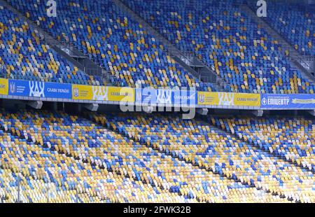 KYIV, UKRAINE - MARCH 28, 2021: Empty tribunes of NSK Olimpiyskiy stadium during the FIFA World Cup 2022 Qualifying round game Ukraine v Finland. Spectators not allowed due to Covid restrictions Stock Photo