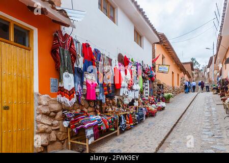 Street scene with tourist souvenir shops in Chinchero, a small Andean rustic village in the Sacred Valley, Urubamba Province, Cusco Region, Peru Stock Photo