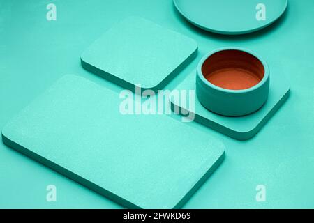 Aqua colour ,  solid aqua textured background with different shapes of objects placed over it Stock Photo