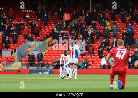 Liverpool, UK. 23rd May, 2021. Wilfried Zaha of Crystal Palace stands up while others take the knee ahead of k/o. Premier League match, Liverpool v Crystal Palace at Anfield Stadium in Liverpool on Sunday 23rd May 2021. this image may only be used for Editorial purposes. Editorial use only, license required for commercial use. No use in betting, games or a single club/league/player publications. pic by Chris Stading/Andrew Orchard sports photography/Alamy Live news Credit: Andrew Orchard sports photography/Alamy Live News Stock Photo