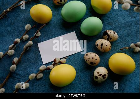 Willow branch, easter eggs and greeting card Stock Photo