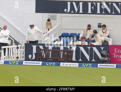 London, UK. 23 May, 2021. London, UK. The Surrey team wait to come back on after a rain delay as Surrey take on Middlesex in  the County Championship at the Kia Oval, day four. David Rowe/Alamy Live News Stock Photo