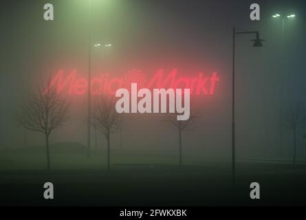 Media markt store in the fog. Media Markt is a German multinational chain of stores selling consumer electronics with over 1000 stores in Europe. Stock Photo