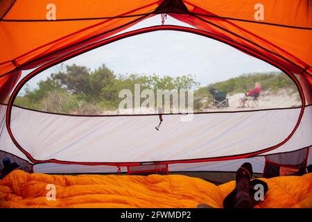A view of the beach from inside the camping tent at Assateague Island National Seashore. Stock Photo