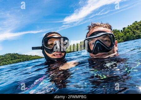couple enjoying diving in Raja Ampat / Indonesia