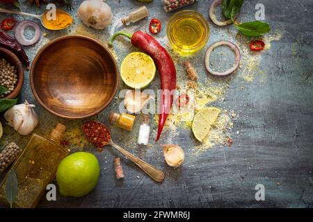 Various herbs and spices on grunge background Stock Photo