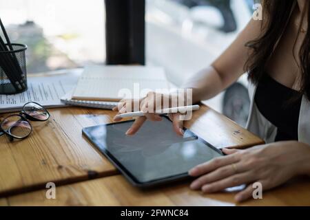 User experience concept. Creative Web Designer sketching application and developing template layout on laptop, framework for digital devices. Stock Photo