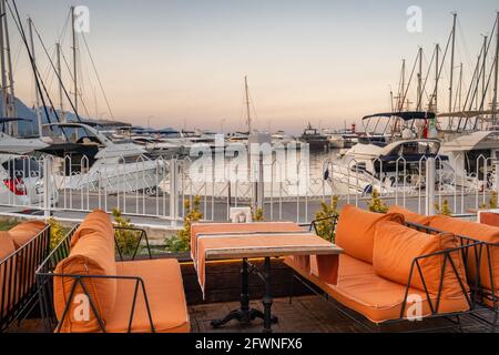 Cozy outdoor cafe in the harbour of Kemer resort town Turkey Stock Photo