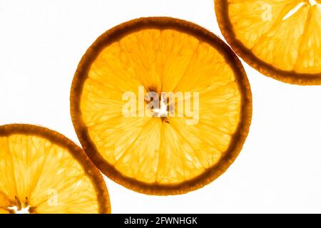 Close up slices of oranges on isolated white background Stock Photo