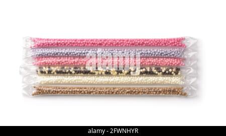 Top view of various milk flavoring straws isolated on white Stock Photo