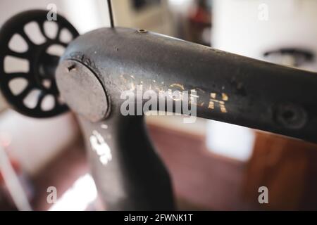 Marghia, Romania - May 5, 2021: Shallow depth of field (selective focus) details with an old Singer sewing machine. Stock Photo