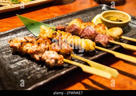 A dish of yakitori at Gomitori an izakaya in Nagoya, Japan. Stock Photo