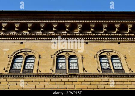 FLORENCE, ITALY - Feb 06, 2016: The facade and windows of the Renaissance Palazzo dei Medici in Florence, Italy. An excellent example of Renaissance a Stock Photo