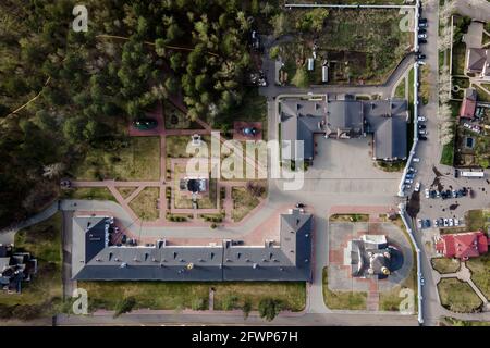 Novouspensky Monastery in Siberia. drone flight map, top view of the building forest. Stock Photo