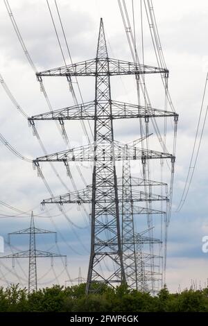 high-voltage power lines in Frechen on the border to Cologne-Weiden, North Rhine-Westphalia, Germany.  Hochspannungsleitungen in Frechen an der Grenze Stock Photo