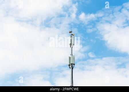 Cellular macro Base Transceiver Station. Telecommunication tower. Wireless Communication Antenna Transmitter. Development of communication systems in Stock Photo