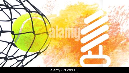 Composition of tennis ball in net with white pattern on orange background Stock Photo