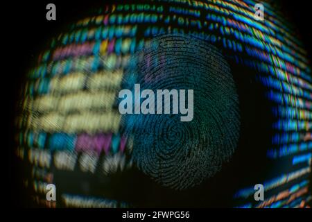 Nice fingerprint on the crumpled background of the code. Abstract computer script code. Software developer code. Stock Photo