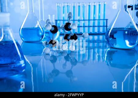 Laboratory equipment, glass filled background Stock Photo