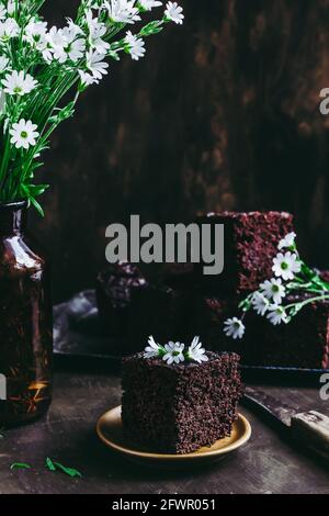 Homemade chocolate biscuit, brownie . Focus on the part of brownies. Stock Photo