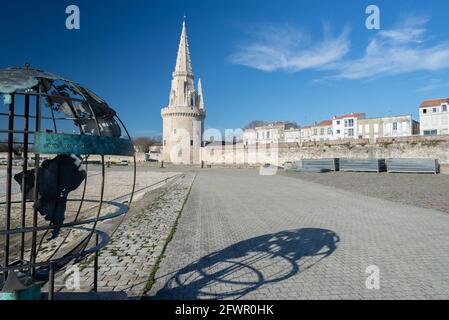 Ancient Lantern Tower (Tour de la Lanterne) in harbour at La Rochelle, France on Atlantic coast of Charente Maritime Stock Photo