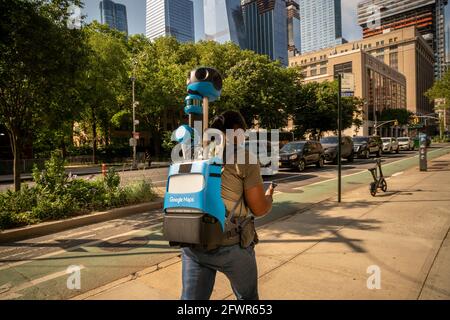 New York, USA. 20th May, 2021. A Google Maps walker in Chelsea in