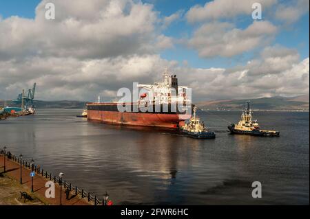 Cape Elise - Bulk Carrier under tow making her way on the River Clyde, Scotland, UK Stock Photo