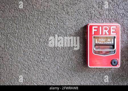 Fire alarm switch on the wall, powerful emergency equipment for industrial and residential Stock Photo