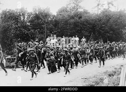 American soldiers escorting German prisoners of war to the prison pens ...