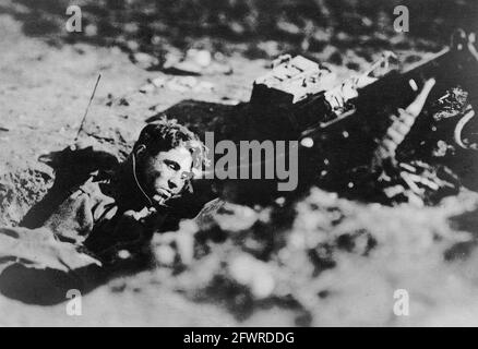 A German soldier who was killed manning his machine gun. This machine gun was part of a machine gun ‘nest’ in the Meuse-Argonne. 1918 Stock Photo