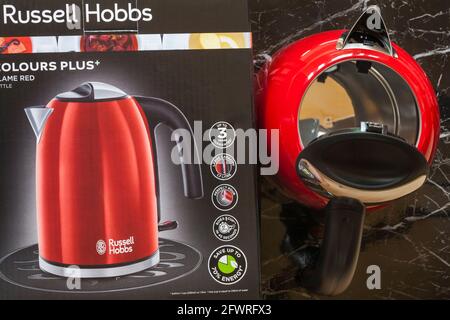 https://l450v.alamy.com/450v/2fwrfx3/russell-hobbs-kettle-with-box-on-black-marbled-effect-background-2fwrfx3.jpg