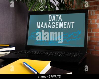 Data management info on the laptop screen. Stock Photo