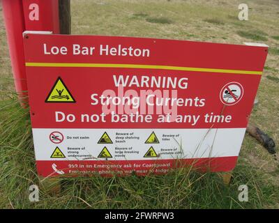 Loe bar helston warning strong currents sign. South west coast path. South Cornwall. West country. England. UK Stock Photo