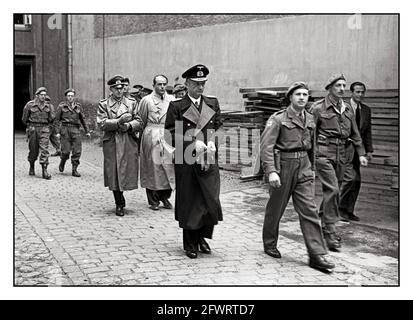 DOENITZ ARREST 1945 WW2 Grand Admiral Karl Doenitz surrender and in cusody along with Albert Speer May 1945, Germany's unconditional surrender to the allies. As Supreme Commander of the Navy beginning in 1943, Nazi Karl Doenitz played a major role in the naval history of World War II. He was briefly the last Fuhrer of the Third Reich, jailed for 10 years at the Nuremberg Trials and released in 1956 Stock Photo