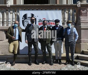 Varese, Italy. 24th May, 2021. Varese, Italy Distinguished Gentleman's Ride world event gathering of motorcyclists of both sexes dressed in vintage and current style in Varese at Villa Ponti In the photo: motorcyclists with their look Credit: Independent Photo Agency/Alamy Live News Stock Photo